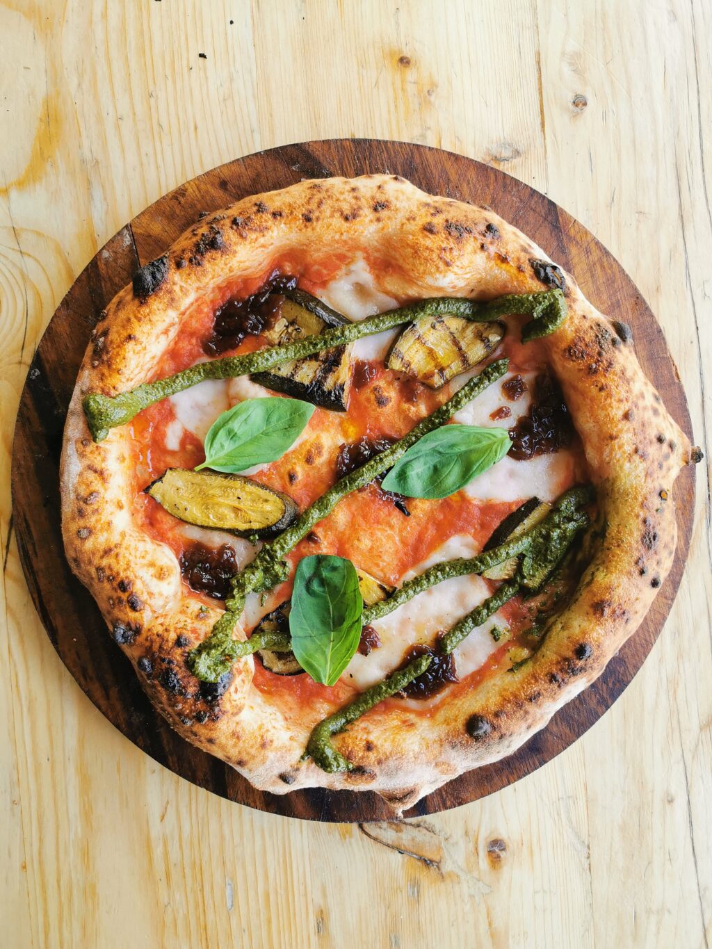 A pesto coated pizza from Purezza A pesto coated pizza from Purezza